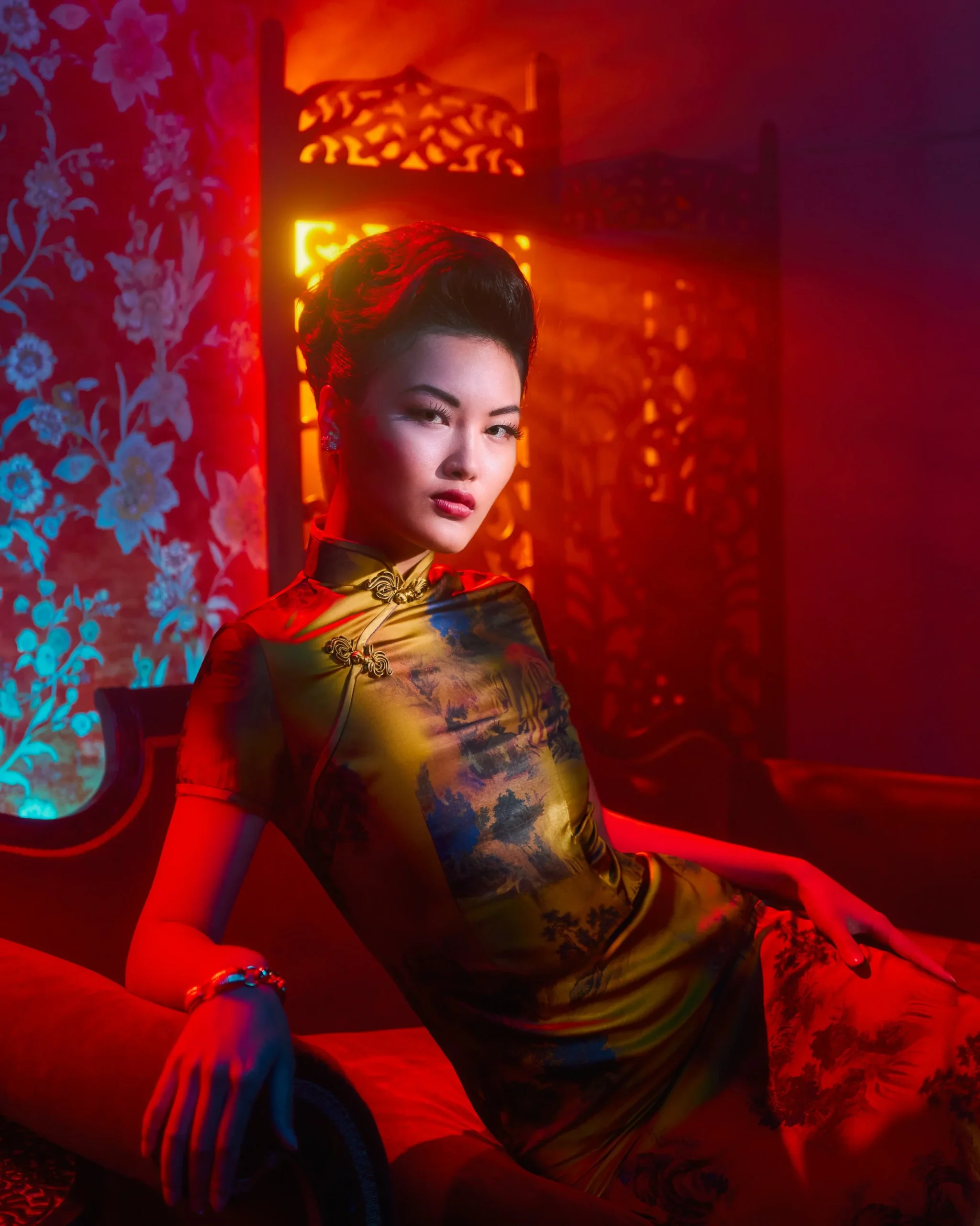 Close-up editorial portrait of a woman in traditional Chinese attire