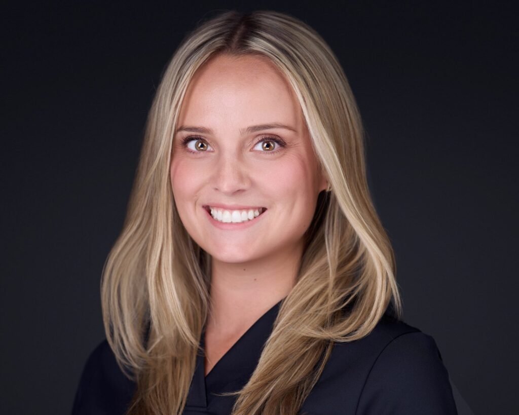 Medical group provider portrait photographed between clinic blocks